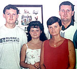 Picture of Eric, his wife, daughter and son