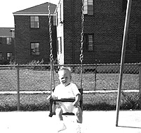 Picture of 8-month old Ricky in a swing